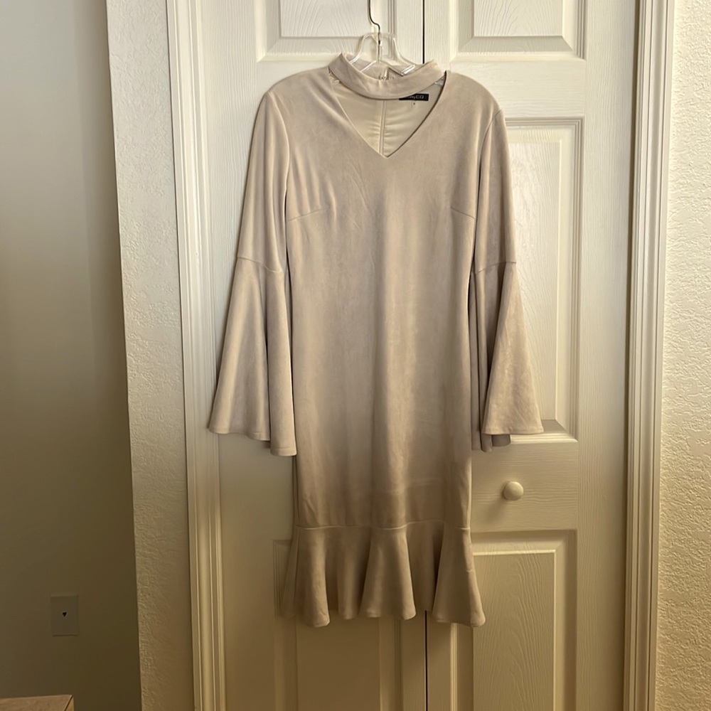 Form Fitting Velvety Dress with Dramatic sleeves and peplum skirt